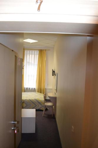 Postel nebo postele na pokoji v ubytování Vilnius centre house