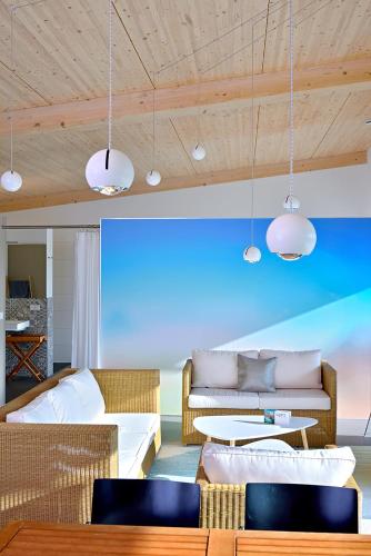 a living room with a couch and a table at LOFT Apartments in Schorndorf
