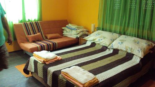 Llit o llits en una habitació de Apartman Rudnik
