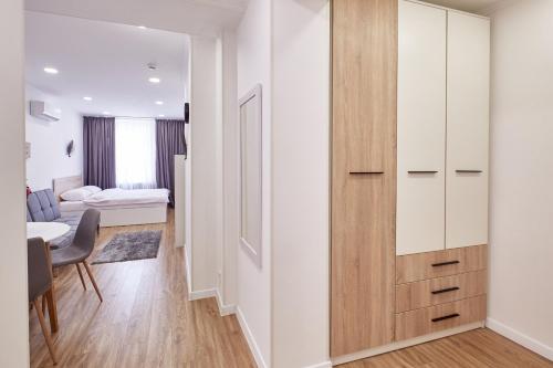 a small apartment with a bedroom and a bed at Nordian in Kharkiv