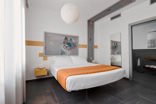 Postel nebo postele na pokoji v ubytování nautilus b&b suite design