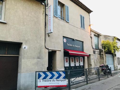 a building on the side of a street at Studios du Rempart in Avignon
