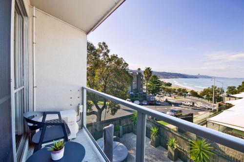 a balcony with a view of the ocean at Lorne Bay View Motel in Lorne