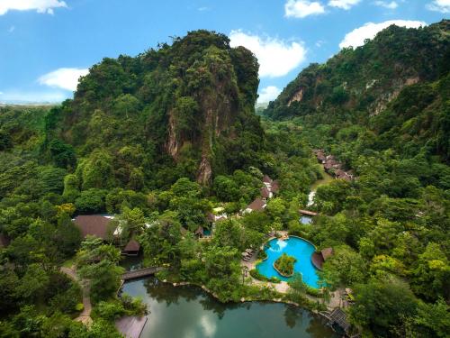 an aerial view of a mountain with a lake at The Banjaran Hotsprings Retreat in Ipoh