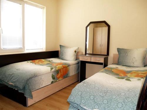 Katil atau katil-katil dalam bilik di Villa Nanevi