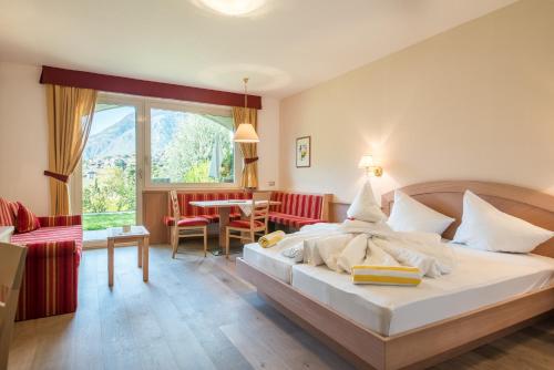 Postel nebo postele na pokoji v ubytování Hotel Wessobrunn