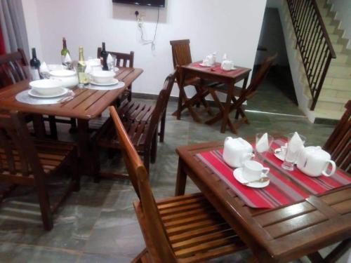 A restaurant or other place to eat at Likizo Guest House