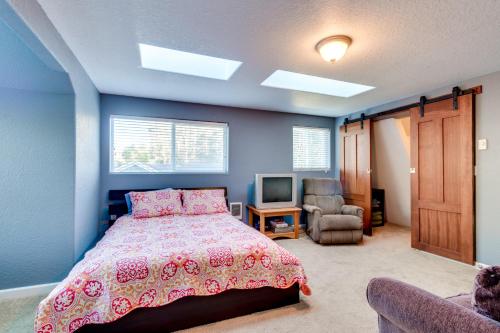 A bed or beds in a room at The Beach Barn