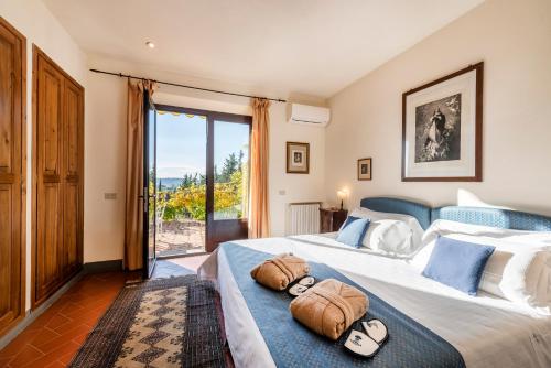 Posteľ alebo postele v izbe v ubytovaní Relais Vignale & Spa