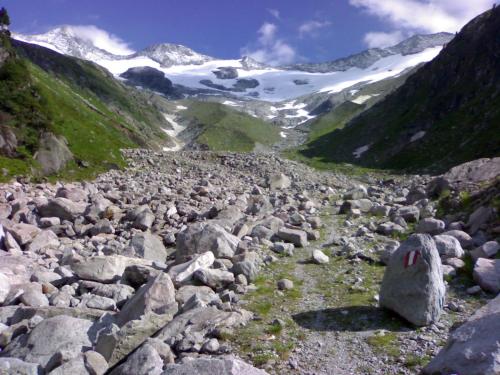a group of rocks on a mountain with snow at Appartments Gerlos Am Bach - Riverside in Gerlos