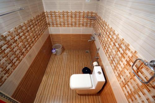 Koupelna v ubytování Marari Sabari Home Stay