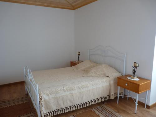 Postel nebo postele na pokoji v ubytování Refugio da Ti Maria