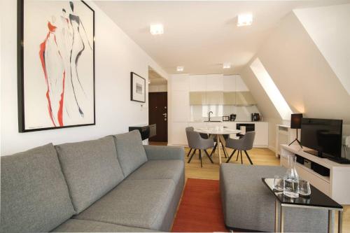 Kuchyň nebo kuchyňský kout v ubytování Apartment with Terrace and Sauna by Grand Apartments