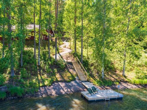 an overhead view of a dock in the middle of a lake at Holiday Home Satakieli by Interhome in Hirsjärvi