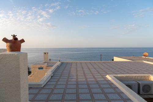 a view of the ocean from the roof of a building at Porto Sisi Hotel Apartments in Sisi
