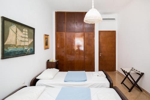 Katil atau katil-katil dalam bilik di Petradi Studios & Villa
