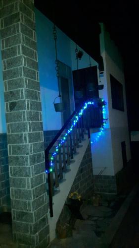a row of blue lights on the side of a building at Casa Vacanze Germano in Aosta
