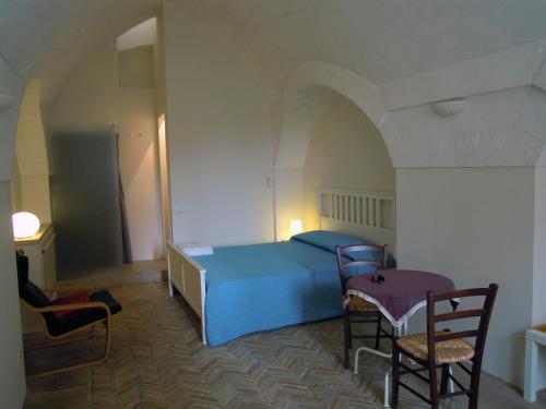 Postel nebo postele na pokoji v ubytování B&b Il Cortile