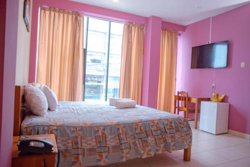 Katil atau katil-katil dalam bilik di Hotel Jhor Bush