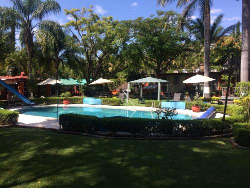 Swimming pool sa o malapit sa Villa Paraiso