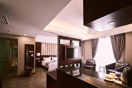 Postel nebo postele na pokoji v ubytování Meritin Hotel