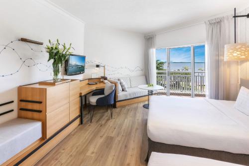 Televiisor ja/või meelelahutuskeskus majutusasutuses Shangri-La The Marina, Cairns