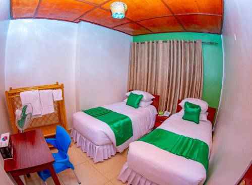 Katil atau katil-katil dalam bilik di B.Maurice Guest House