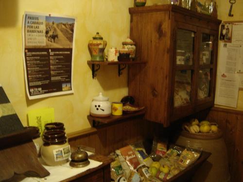 a kitchen with a counter with some food on it at Casa Rural "La Bardena Blanca I " in Arguedas