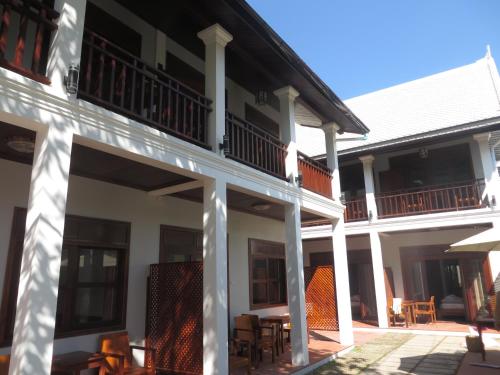 a view of the outside of a building at QUEEN'S HOUSE in Luang Prabang