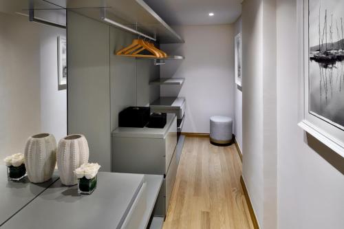 a small bathroom with a toilet in a room at Al Alamein Hotel in El Alamein