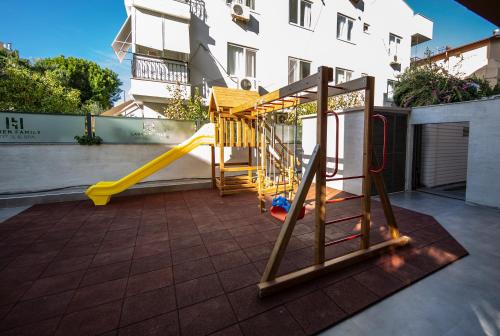 a playground on the roof of a building at Laren Family Hotel & Spa - Boutique Class in Antalya