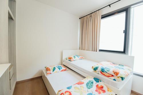 23 Degree Condominium R76にあるベッド