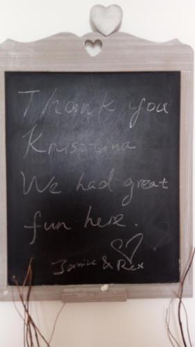 a chalk board with a heart written on it at Seaview Luxury Penthouse with Shared Swimming Pool in Għajnsielem