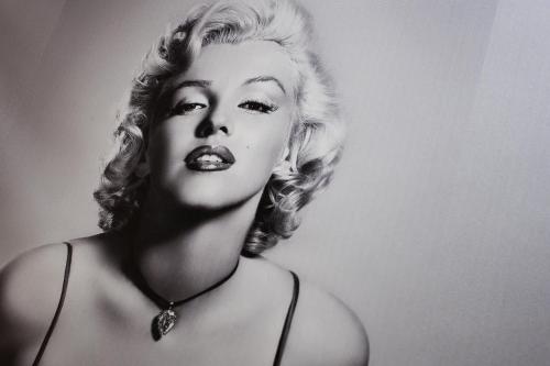 a portrait of a woman with curly hair at Hotel Cineholiday in Naples