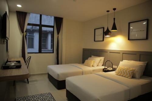 Postel nebo postele na pokoji v ubytování Mars Hotel