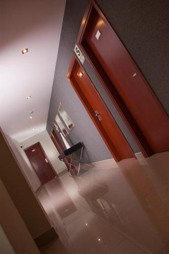 an overhead view of a living room with wood trim at Sunec Hotel in Chiclayo