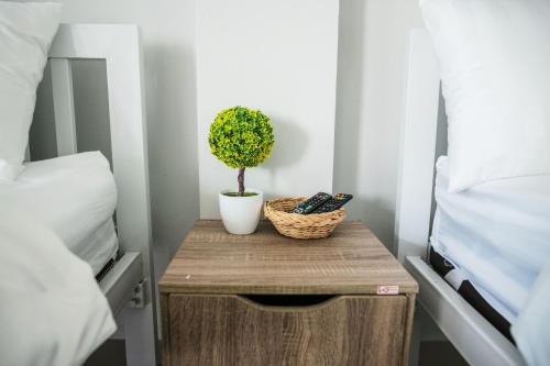 Postel nebo postele na pokoji v ubytování Lullaby Residence