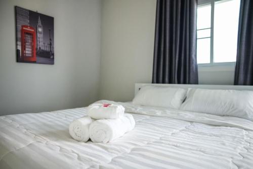 Postel nebo postele na pokoji v ubytování Lullaby Residence
