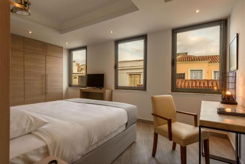 Posteľ alebo postele v izbe v ubytovaní Fos Residential Apartments
