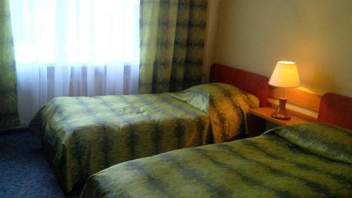 Кровать или кровати в номере Willa "Zimowit" w Wiśle
