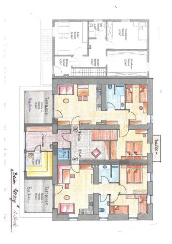 a floor plan of a building with colorful at Hotel Brunnwirt in Weissbriach