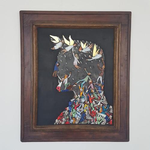 a framed painting of a woman with butterflies at Alba Hotel in Marina di Ravenna