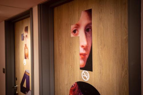 a wall with a picture of a man on it at ibis Styles Douai Gare Gayant Expo in Douai