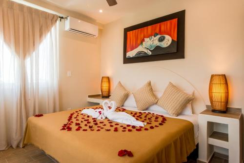 En eller flere senge i et værelse på Casa Leo