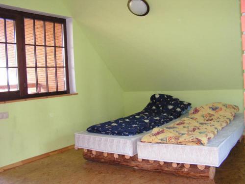 Кровать или кровати в номере Avotnieki