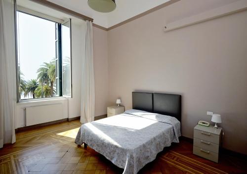 Säng eller sängar i ett rum på Hotel Mediterranee