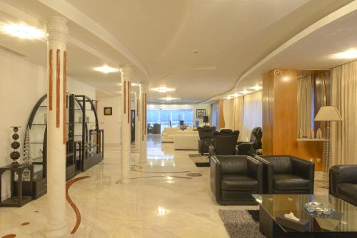 Zona de estar de The Penthouse Suites Hotel