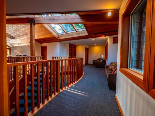 a hallway of a house with a skylight at The Cabins at Terrace Beach in Ucluelet
