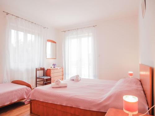 Postel nebo postele na pokoji v ubytování Apartments Dirk