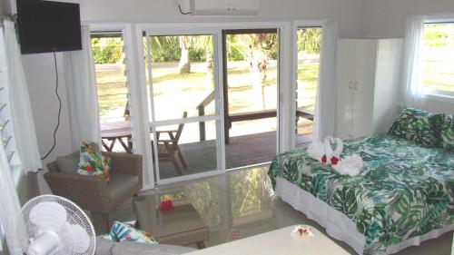 Postel nebo postele na pokoji v ubytování Muri Villas